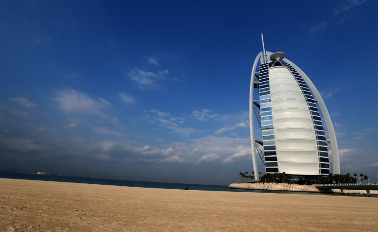 The iconic Burj al-Arab hotel is seen on the coast of Dubai on November 25, 2013. u00e2u20acu201d AFP pic