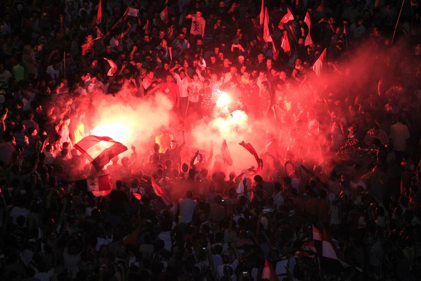 Protesters opposing Egyptian President Mohamed Mursi gather near a lit a flare during a protest at Tahrir Square in Cairo June 30, 2013. u00e2u20acu201d Reuters pic
