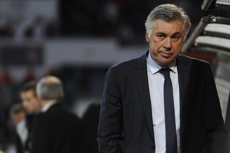 Paris Saint-Germain's coach Carlo Ancelotti reacts on May 26, 2013 during a French L1 football match against Lorient at the Moustoir stadium in the western French town of Lorient. u00e2u20acu201c AFP pic