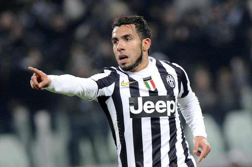 Juventusu00e2u20acu2122 Carlos Tevez celebrates after scoring against Sassuolo during their Italian Serie A match at the Juventus Stadium in Turin December 15, 2013. u00e2u20acu2022 Reuters pic