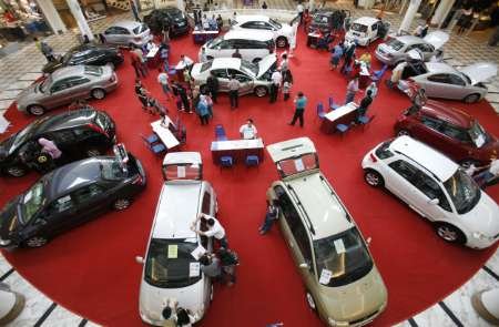 Cars for sale are displayed in a shopping mall in Putrajaya on October 25, 2008. u00e2u20acu201d Reuters pic