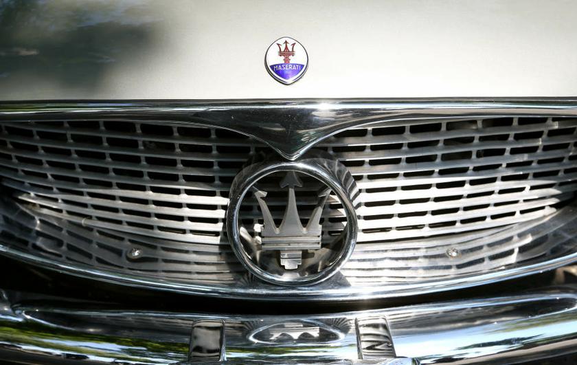 The logo of Italian manufacturer Maserati is seen at a 1962 3500 GT sports car during a prologue of the Raid Suisse-Paris 2013 vintage car rally in Zurich on August 21, 2013. u00e2u20acu201d Reuters pic