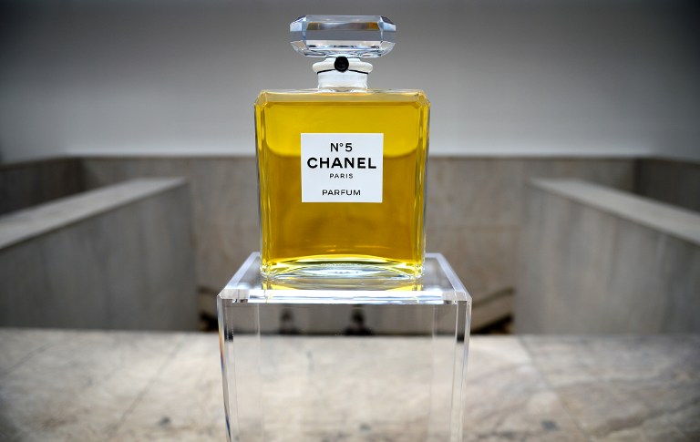 A perfume flask of u00e2u20acu02dcChanel Nu00c2u00b05u00e2u20acu2122 is displayed as part of the exhibition u00e2u20acu02dcNu00c2u00b05 culture Chanelu00e2u20acu2122 at the Palais de Tokyo in Paris on May 3, 2013. u00e2u20acu201d AFP pic