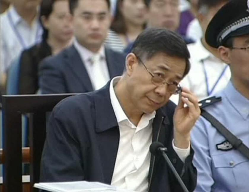 Ousted senior Chinese politician Bo Xilai attends the fifth day of his trial at the Jinan Intermediate People's Court in Jinan, Shandong province August 26, 2013 in this still image taken from China Central Television (CCTV) footage. The trial of Bo ended