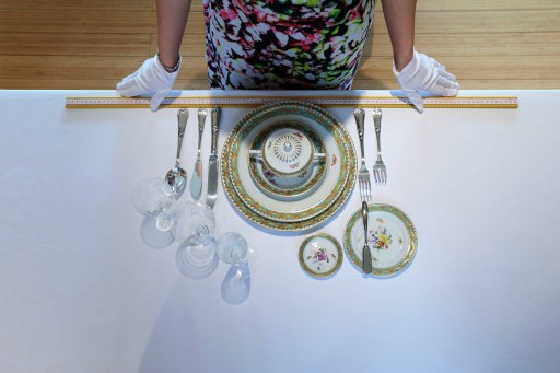 This undated picture released by Institute Sarita shows its founder Sarah Jane Ho teaching table manners in Beijing. — AFP pic