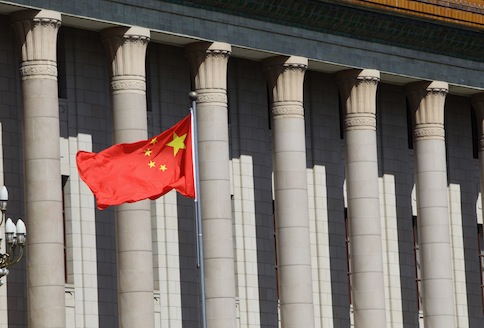 A Chinese national flag flaps in the wind outside the Great Hall of the People, the venue of the annual session of Chinau00e2u20acu2122s parliament, in Beijing, July 5, 2013. u00e2u20acu201d Reuters pic