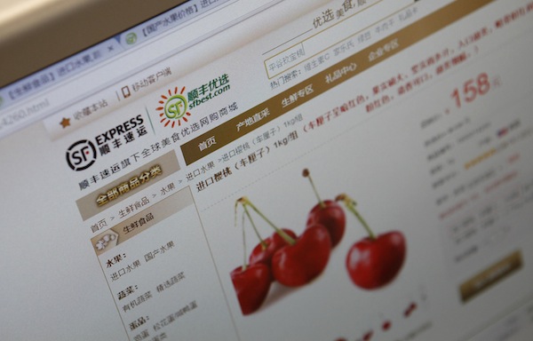 A web page of the Shunfeng First Choice website (sfbest.com) selling imported cherry is seen on a computer screen in this picture illustration taken in Beijing August 8, 2013. u00e2u20acu201d Reuters pic