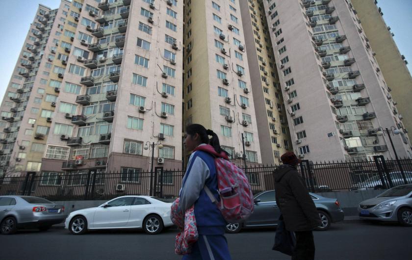 A student walks along a street next to a school-area neighbourhood in Beijing, December 6, 2013. u00e2u20acu201d Reuters pic