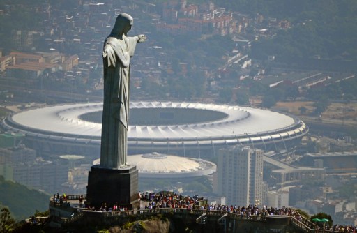 Aerial view of the Christ the Redeemer statue atop Corcovado Hill and the Mario Filho (Maracana) stadium in Rio de Janeiro, Brazil on May 10, 2013. u00e2u20acu201d AFP pic