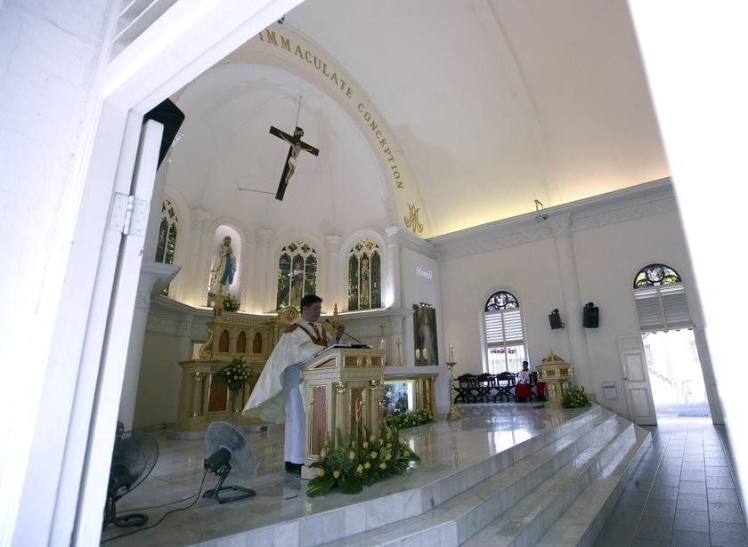 A priest leads a mass inside the church of Our Lady of Lourdes in Klang, outside Kuala Lumpur January 12, 2014. u00e2u20acu201d Reuters pic