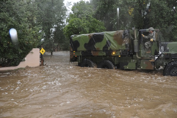 Colorado National Guardsmen drive through floodwaters in Boulder County, Colorado in this handout picture provided by the Army National Guard and taken on September 12, 2013. u00e2u20acu201d Reuters pic