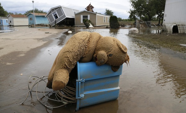 A stuffed teddy bear chair lies slumped over in the flooded Eastwood Village in Evans, Colorado September 23, 2013. u00e2u20acu201d Reuters pic