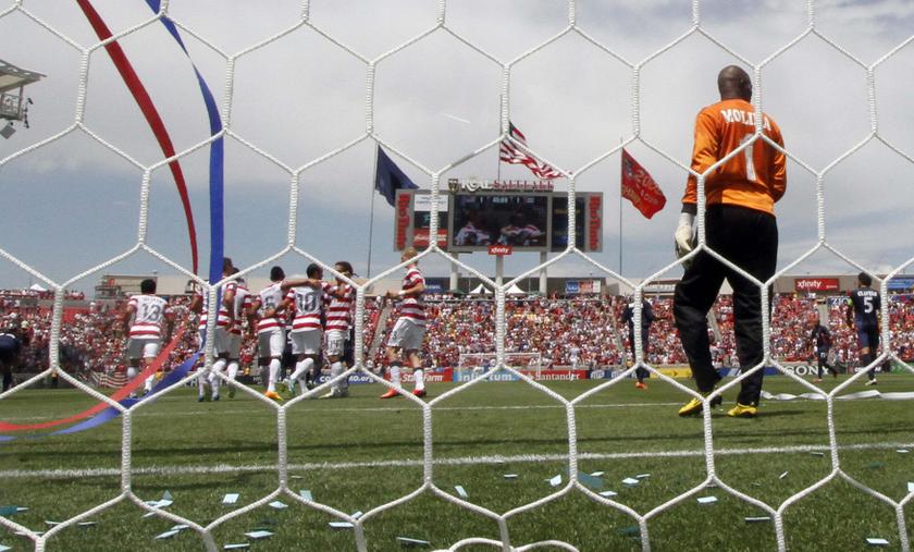 Landon Donovan (10) of the US is congratulated after scoring a goal past Cuba's goalkeeper Odelin Molina during their CONCACAF Gold Cup soccer match in Salt Lake City, Utah, July 13, 2013. u00e2u20acu201c Reuters pic