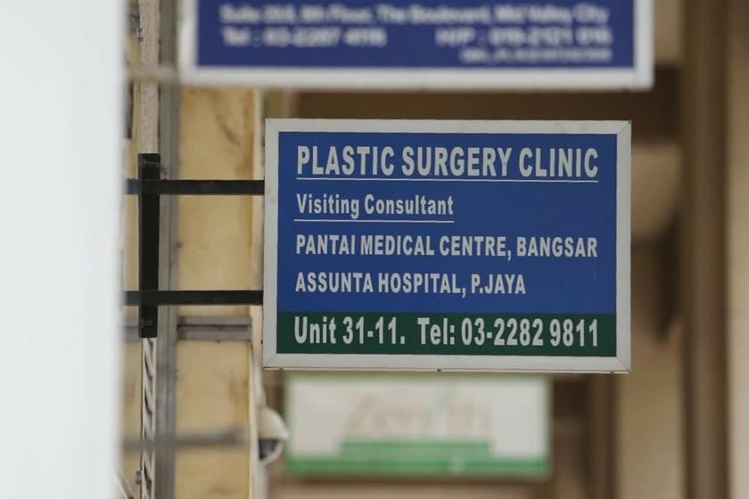 A sign advertising plastic surgery in Bangsar, Kuala Lumpur, and Petaling Jaya. — Picture by Choo Choy May