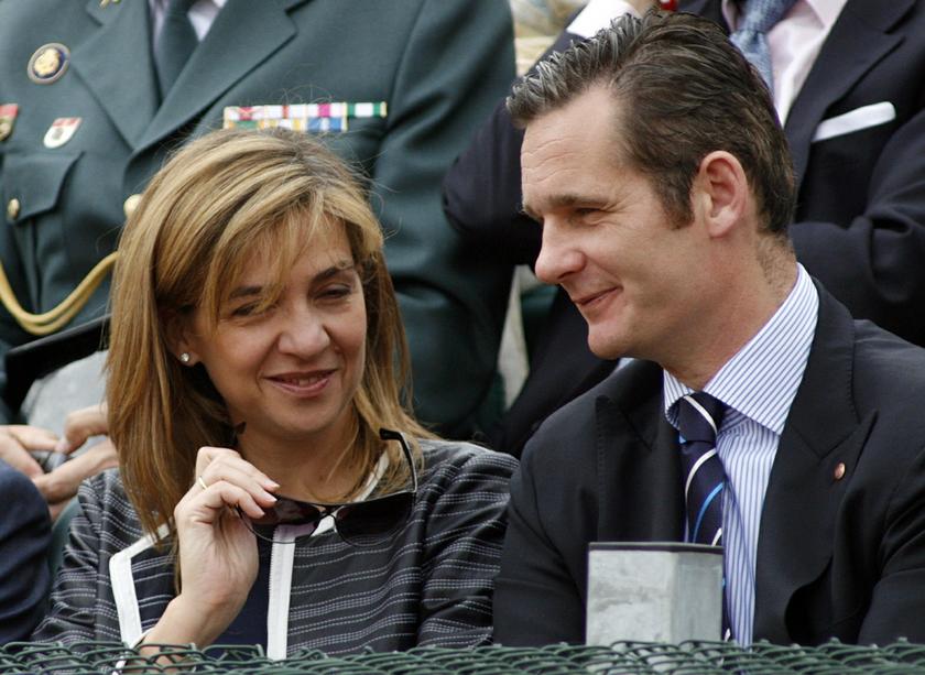 Spain's Infanta Cristina (L) and her husband Inaki Urdangarin speak during the finals of the Barcelona Open tennis tournament in Barcelona in this April 29, 2007 file photo. u00e2u20acu201d Reuters pic