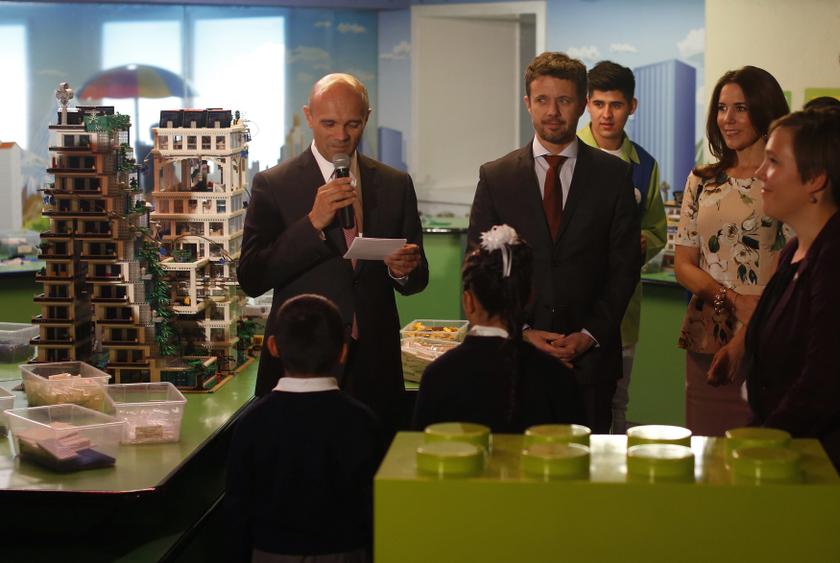 Denmarku00e2u20acu2122s Crown Prince Frederik (centre) and Crown Princess Mary listen to an explanation about an area where Danish company LEGO educate children about the environment at the Papalote Childrenu00e2u20acu2122s Museum in Mexico City, November 12, 2013. u00e2u20acu2022 Reuters p