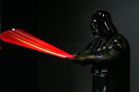 A man dressed as Star Wars character Darth Vader poses for photographers at the u00e2u20acu0153Star Wars: Where Science Meets Imaginationu00e2u20acu009d exhibition at the Powerhouse Museum in Sydney December 3, 2008. u00e2u20acu201d Reuters pic