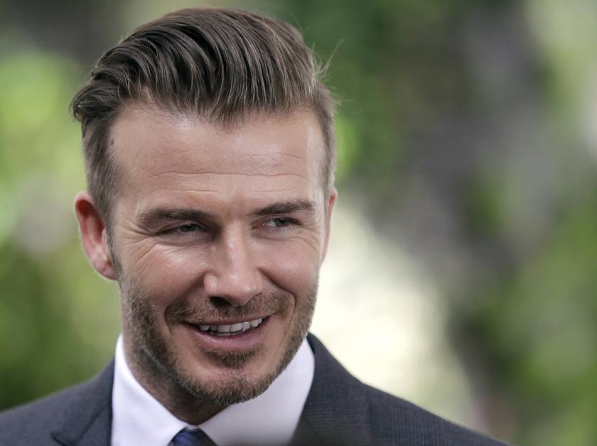 David Beckham smiles after a news conference in Miami, Florida February, 5, 2014. u00e2u20acu201d Reuters pic