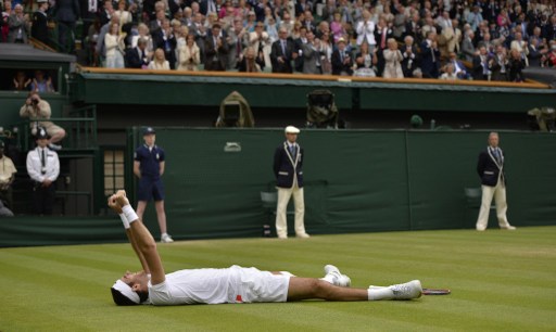 Argentinau00e2u20acu2122s Juan Martin Del Potro celebrates beating Spainu00e2u20acu2122s David Ferrer during their menu00e2u20acu2122s singles quarter-final match at Wimbledon July 3, 2013. u00e2u20acu201d AFP pic