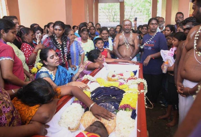 File photo of family members and friends crying at the funeral of N. Dhamendran in Kuala Lumpur in May. u00e2u20acu201d Picture by Choo Choy May