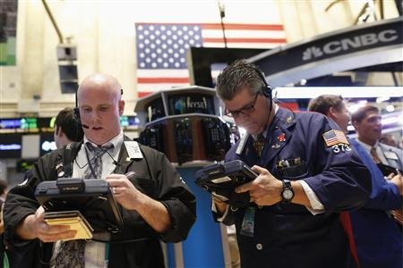 Traders work on the floor at the New York Stock Exchange on June 17, 2013. u00e2u20acu201d Reuters pic