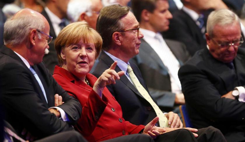 Chancellor Merkel at the opening, next to Daimler CEO Zetsche (left). On her left is VDA president Wissmann, and on the right, Volkswagen CEO Martin Winterkorn. — Reuters pic