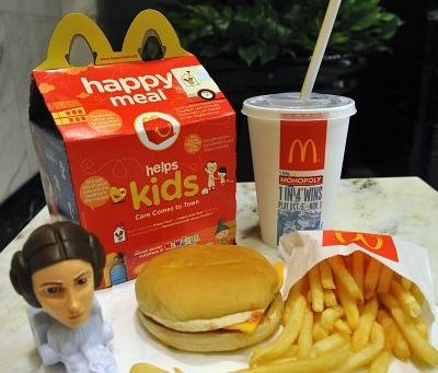 Instead of a toy, kids in the US will get a book with McDonald's Happy Meal from Nov 1, 2013 AFP pic