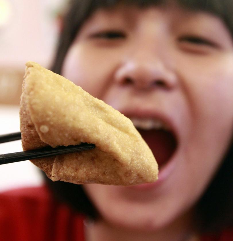 The smellier the better: A customer sinks in her teeth.