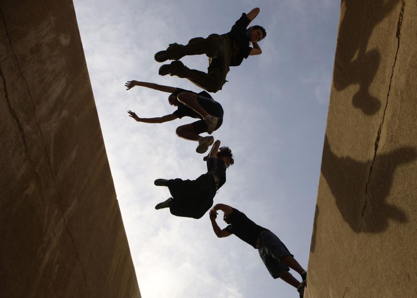 Members of Egy PK, one of the first Parkour groups in Egypt, execute stunts during a street performance in Cairo in this February 10, 2010 file photo. u00e2u20acu201d Reuters pic