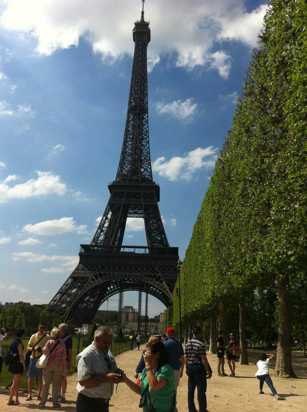 The Eiffel Tower dominates the Champ de Mars gardens and attracts close to seven million visitors each year. — Pictures by Helen Hickey