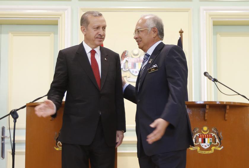 Visiting Turkeyu00e2u20acu2122s Prime Minister Tayyip Erdogan talks with Malaysian counterpart Datuk Seri Najib Razak after a news conference in Putrajaya outside Kuala Lumpur January 10, 2014. u00e2u20acu201d Reuters pic