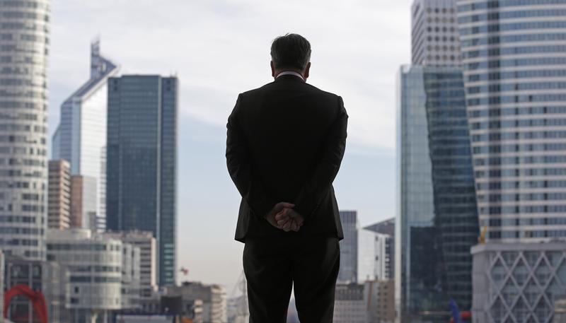 A businessman is silhouetted as he stands under the Arche de la Defense, in the financial district west of Paris, November 20, 2012. u00e2u20acu201d Reuters pic