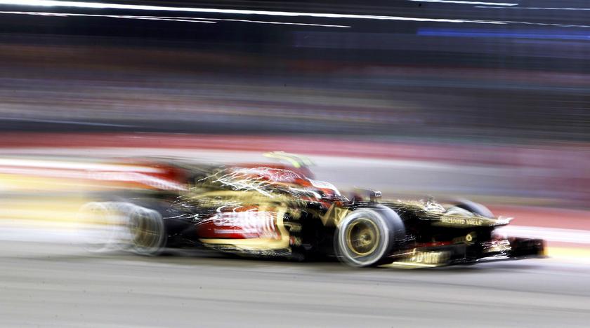 Lotus F1 Formula One driver Romain Grosjean of France drives during the second practice session of the Singapore F1 Grand Prix at the Marina Bay street circuit in Singapore September 20, 2013