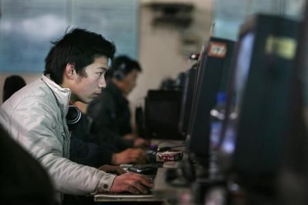 Chinese internet users go online at an internet shop in Beijing April 2, 2008 Reuters pic