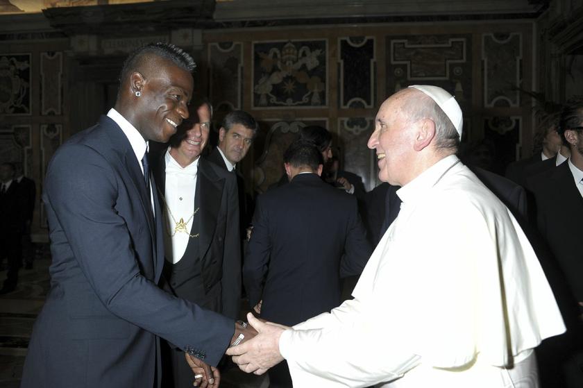 A firm handshake from Italy hitman Mario Balotelli.
