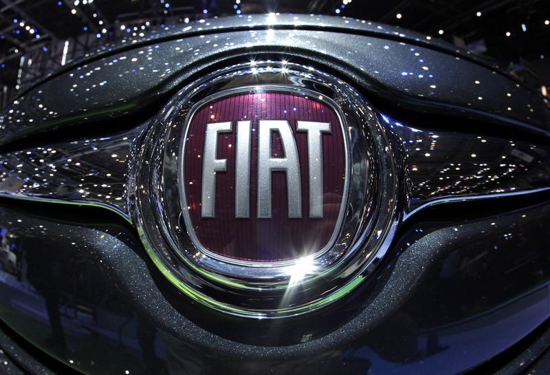The Fiat logo is seen in a car displayed on the Fiat booth during the first media day of the Geneva Auto Show at the Palexpo in Geneva in this March 6, 2012 file photo. u00e2u20acu201d Reuters pic