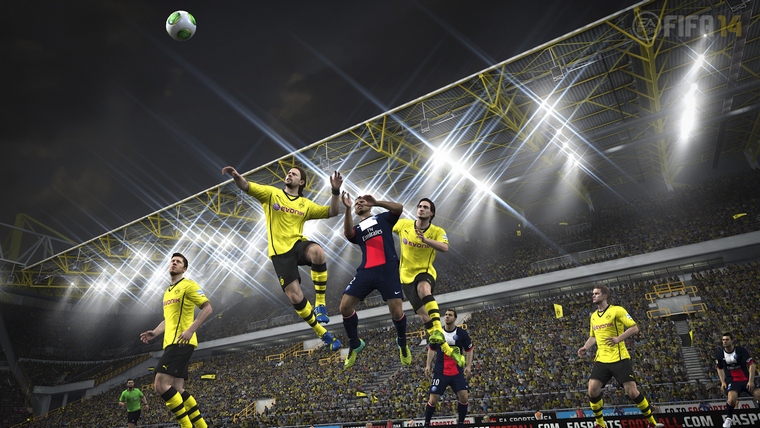 Dortmund and Paris Saint-Germain jostle for the ball in 'FIFA 14'. u00e2u20acu201d AFP-pic