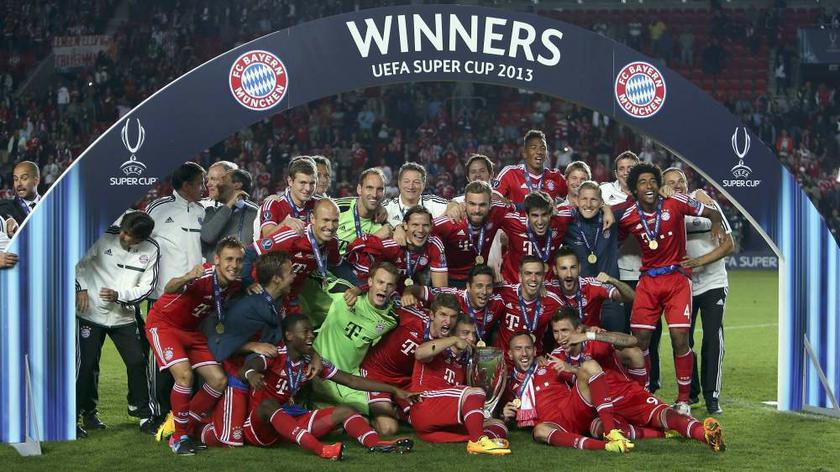 Bayern Munich players pose for a picture after defeating Chelsea in the UEFA Super Cup final match at Eden stadium in Prague on August 30, 2013. u00e2u20acu201d Reuters pic