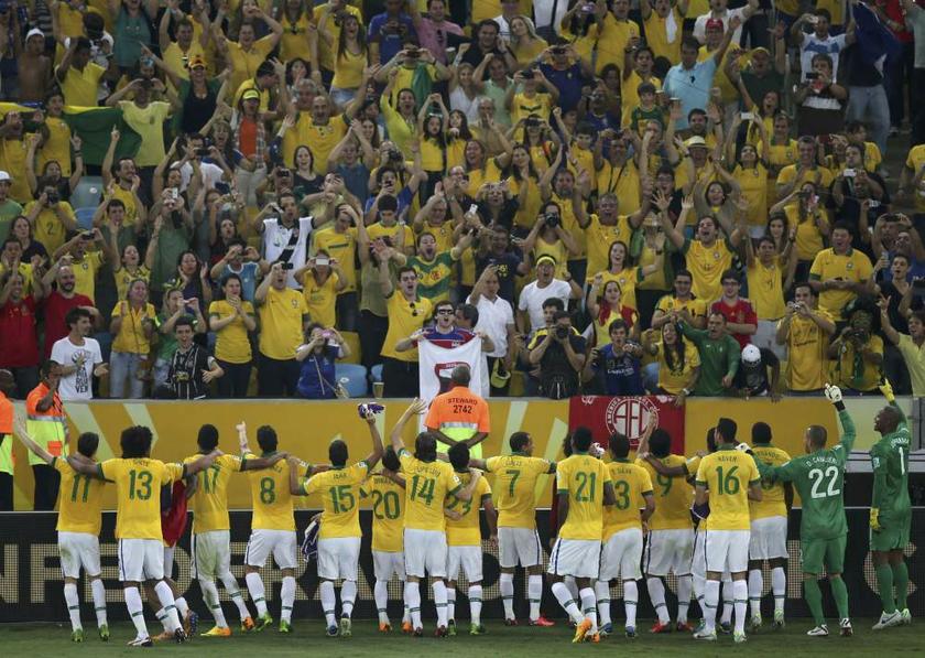 Brazil celebrate their victory over Spain in the Confederations Cup final match with their fans at the Maracana in Rio de Janeiro on June 30, 2013. u00e2u20acu201d Reuters pic