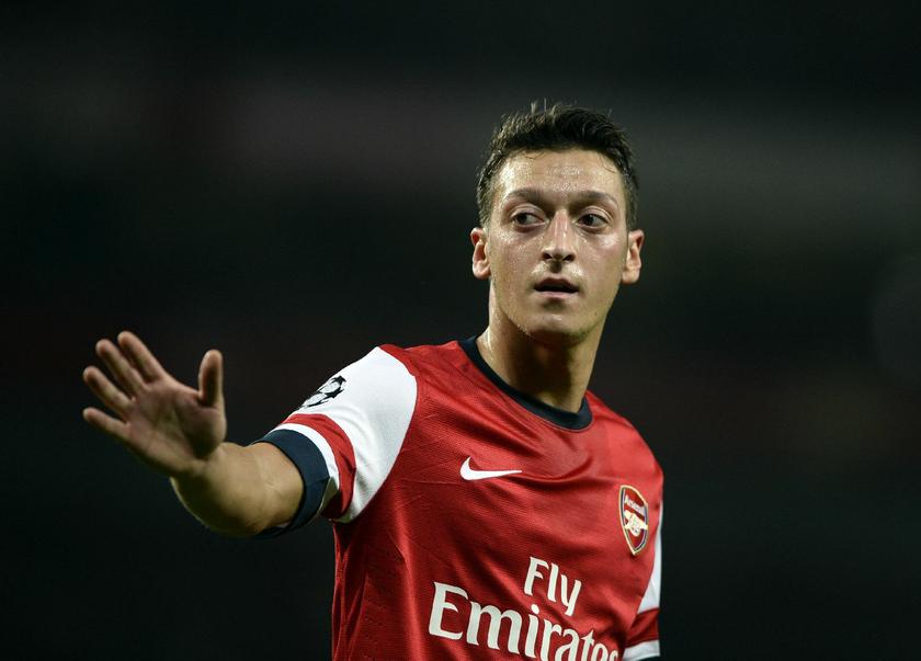Arsenal's Mesut Ozil reacts during their Champions League soccer match against Napoli at the Emirates stadium in London October 1, 2013 Reuters pic