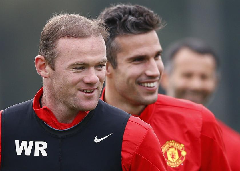 Manchester United's Wayne Rooney (L) and Robin van Persie attend a training session at the Carrington training complex in Manchester, northern England October 1, 2013 Reuters pic