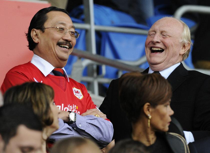 Cardiff City's owner Vincent Tan (L) with former Labour Leader Neil Kinnock, English Premier League match against Newcastle United at Cardiff City Stadium in Cardiff, Wales, October 5, 2013 Reuters pic