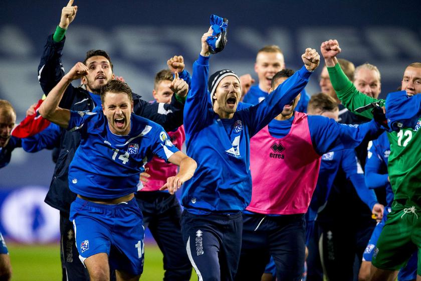 Iceland's team celebrate after their 2014 World Cup qualifying football match against Norway at Ullevaal stadium in Oslo, October 15, 2013, which ended 1-1 Reuters pic