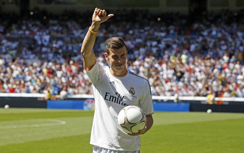 The u00e2u201au00ac100 million (RM427 million) wave: Thousands of Real Madrid fans flock to the Bernabeu September 2, 2013, to welcome new signing Gareth Bale of Wales, bought from Tottenham Hotspur for what the London club said was a world transfer record fee