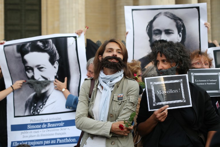 Feminist activists take part in a protest to ask for more women to be transferred in the French Pantheon monument honouring illustrious deceased people on August 26, 2013 in Paris. u00e2u20acu201d AFP pic