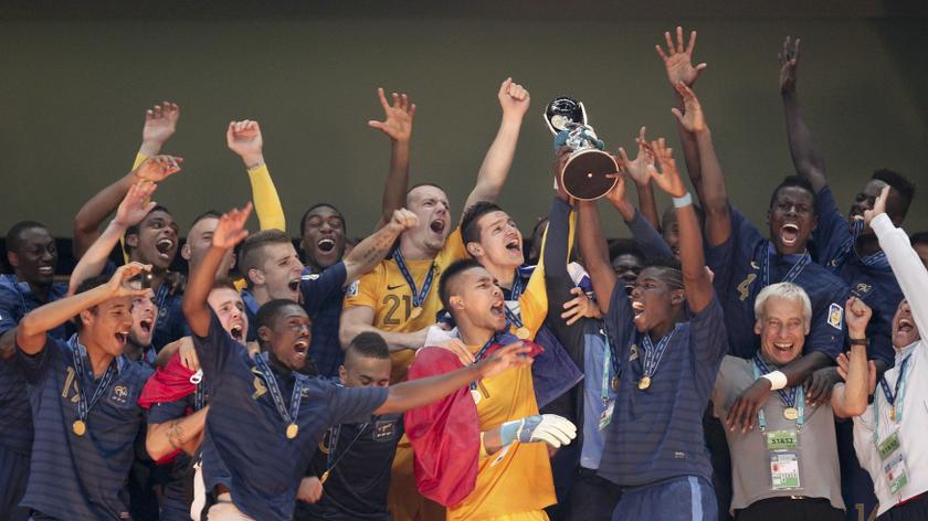 France's team players celebrate with trophy their victory over Uruguay in the final match of the FIFA Under-20 tournament in Istanbul, July 13, 2013. u00e2u20acu201c Reuters pic