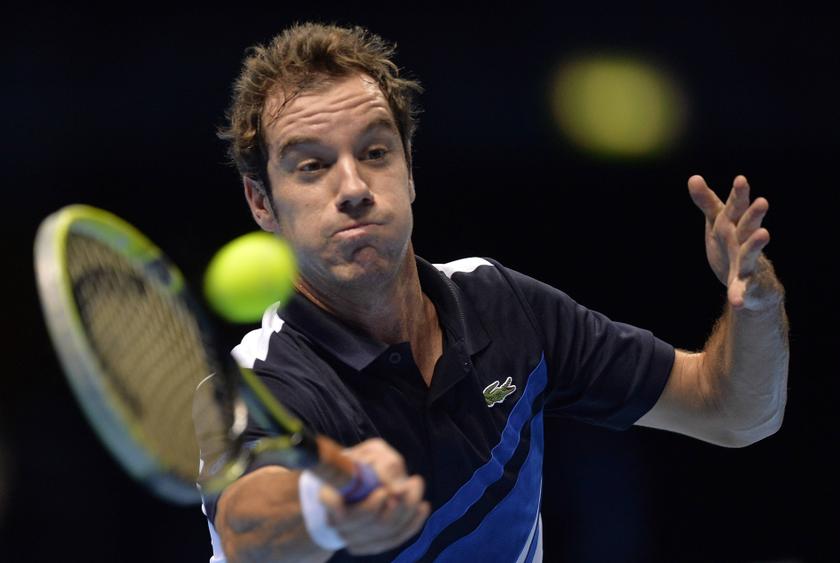 Richard Gasquet of France returns the ball against Juan Martin del Potro of Argentina during their ATP World Tour Finals tennis match at the 02 Arena in London, November 4, 2013. Reuters pic