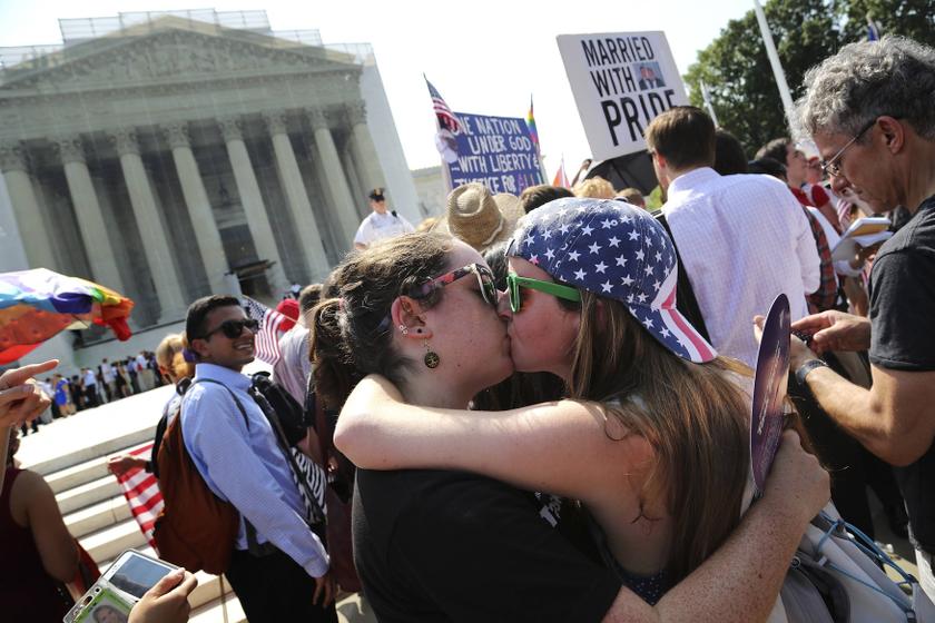 Sarah Beth Alcabes (left) kisses girlfriend Meghan Cleary, both of California outside the court in Washington, June 26, 2013. u00e2u20acu201d Reuters pic