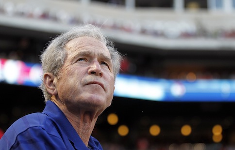 Former US president George W. Bush watches before the start of the MLB American League baseball game between the Texas Rangers and the Chicago White Sox in Arlington, Texas in this April 30, 2013 file photo. u00e2u20acu201d Reuters pic