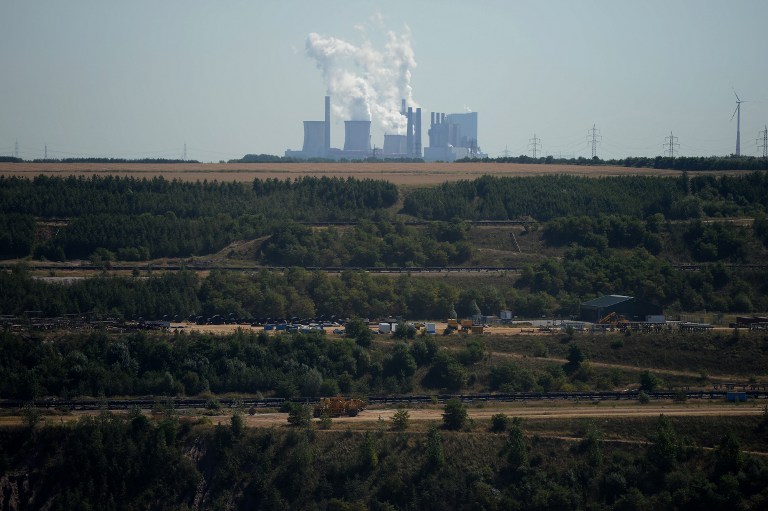 A power plant run by coal from the brown coal open cast mine Garzweiler is pictured on August 5, 2013 in Immigrath, western Germany. u00e2u20acu201d AFP pic